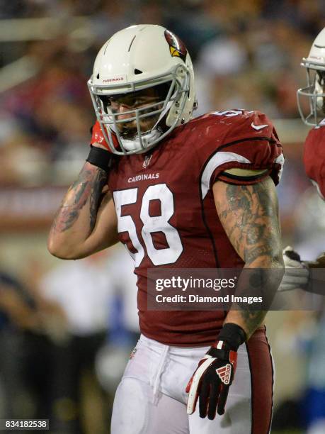 Linebacker Scooby Wright of the Arizona Cardinals walks off the field in the fourth quarter of the 2017 Pro Football Hall of Fame Game on August 3,...