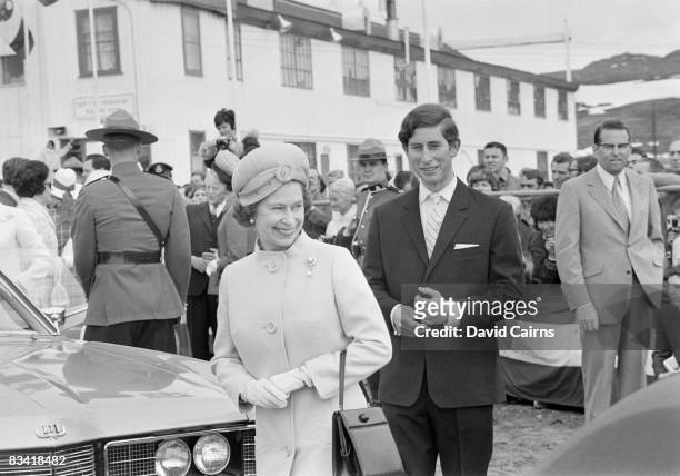 Queen Elizabeth II and Prince Charles arrive at Frobisher Bay on Baffin Island during a visit to Canada, July 1970.