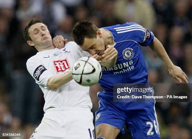 John Terry, Chelsea and Robbie Keane, Tottenham Hotspur battle for the ball