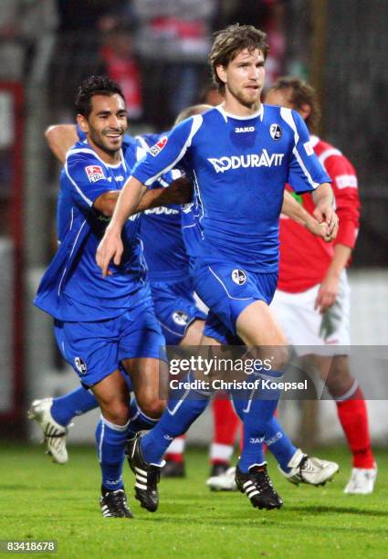 Andreas Glockner of Freiburg celebrates the second goal with Yacine Abdessadki of Freiburg during the 2nd Bundesliga match between RW Ahlen and SC...