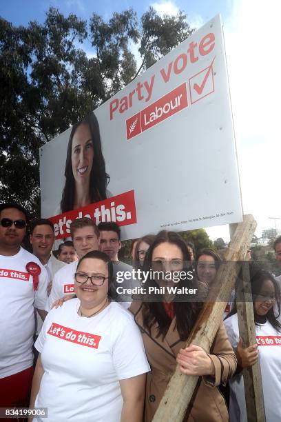 Labour Party leader Jacinda Ardern poses with supporters after unveiling the new election campaign hoardings on August 18, 2017 in Auckland, New...