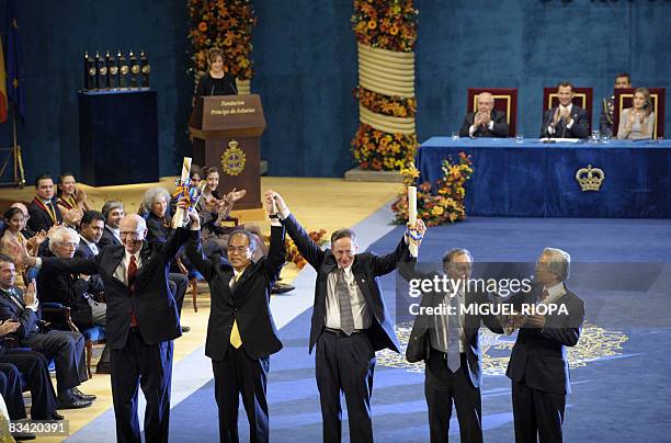 Scientists George Whitesides, Shuji Nakamura, Tobin Marks, Robert Langer and Sumio Iijima receive applause from the audience after being awarded the...