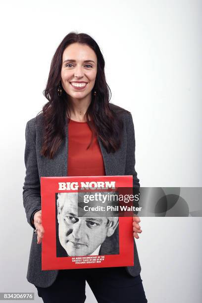 New Zealand Labour Party leader Jacinda Ardern poses for a portrait at her Mt Albert electorate office holding a picture of former Labour Prime...