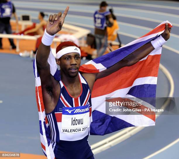 Great Britain's Phillips Idowu celebrates after taking gold in the Men's Triple Jump Final during the IAAF World Indoor Championships at the Palau...