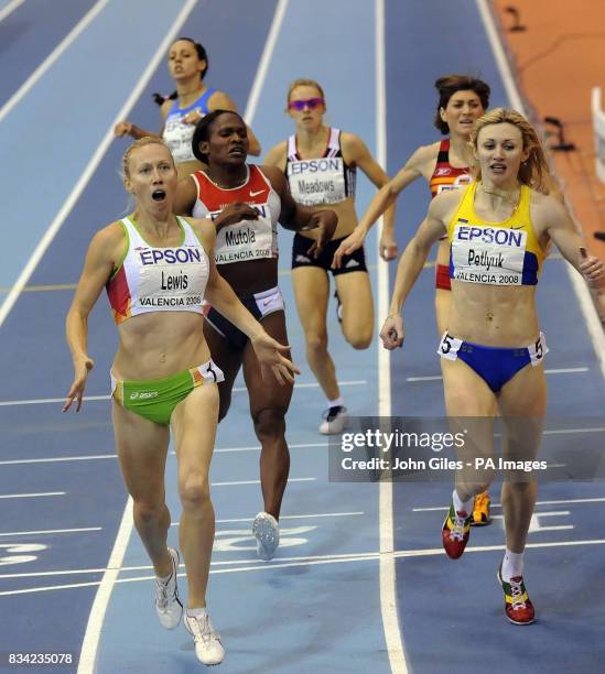 Australia's Tamsyn Lewis appears shocked as she beats Maria Mutola into third place with Great Britain's Jenny Meadows behind in the Finals of the...