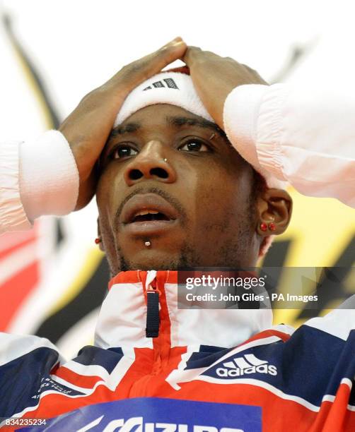 Great Britain's Phillips Idowu celebrates after taking gold in the Men's Triple Jump Final during the IAAF World Indoor Championships at the Palau...