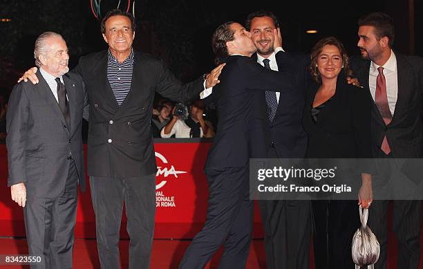 Producer Aurelio de Laurentiis, actor Christian De Sica and director Brando De Sica with Silva Verdone attends the Parlami Di Me Premiere during the...