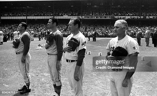 Former secondbaseman Bobby Doerr of the Boston Red Sox, pitcher Bob Feller of the Cleveland Indians, outfielder Rocky Colavito of the Indians, and...