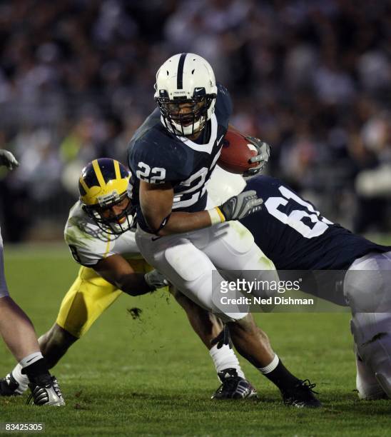 Running back Evan Royster of the Penn State Nittany Lions runs against the University of Michigan Wolverines at Beaver Stadium on October 18, 2008 in...