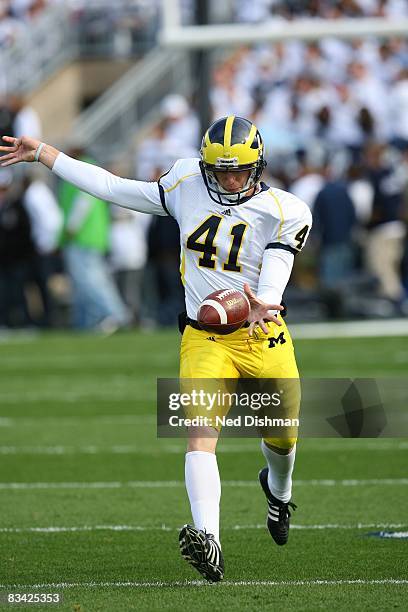 Punter Zoltan Mesko of the University of Michigan Wolverines punts against the Penn State Nittany Lions at Beaver Stadium on October 18, 2008 in...