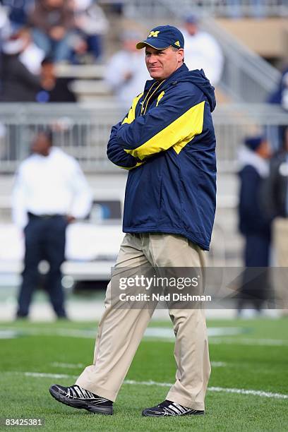 Head coach Rich Rodriguez of the University of Michigan Wolverines walks on the field prior to game against the Penn State Nittany Lions at Beaver...