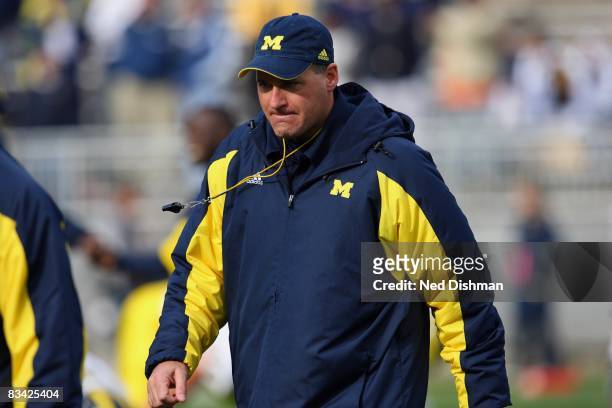 Head coach Rich Rodriguez of the University of Michigan Wolverines walks on the field prior to game against the Penn State Nittany Lions at Beaver...