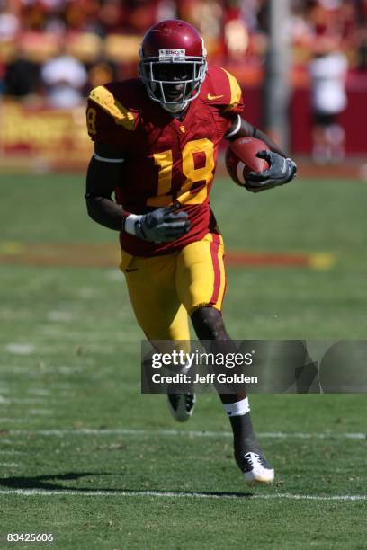 Damian Williams of the USC Trojans runs after a catch against the Arizona State Sun Devils on October 11, 2008 at the Los Angeles Memorial Coliseum...