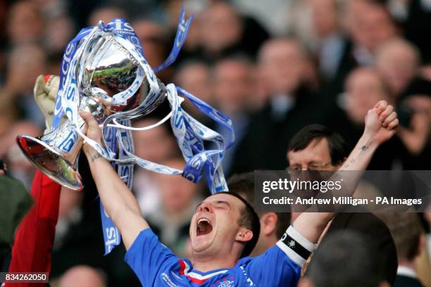 Rangers' Barry Ferguson celebrates with the trophy following their victory in the CIS Insurance Cup Final match at Hampden Park, Glasgow.