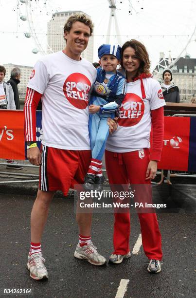 James Cracknell, Beverley Turner and Croyde get ready to run the London Sainsburys Sport Relief Mile on Victoria Embankment, London.