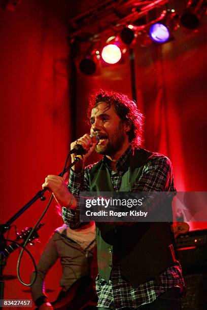 Singer/guitarist Kevin Drew of Broken Social Scene performs onstage at the CMJ Music Marathon at Brooklyn Masonic Temple on October 24, 2008 in New...