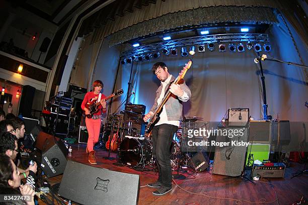 Singer/guitarist Elizabeth Powell bassist Chris McCarron and drummer Eric Thibodeau of Land of Talk performs onstage at the CMJ Music Marathon at...