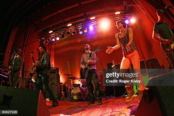 Singer/guitarist Kevin Drew of Broken Social Scene and Elizabeth Powell of Land of Talk perform with Broken Social Scene onstage at the CMJ Music...