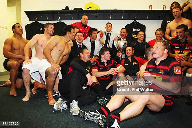 Canterbury celebrate in the dressing room with the trophy following the Air New Zealand Cup Final match between the Wellington Lions and Canterbury...