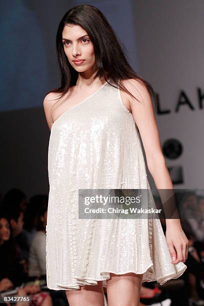 Indian model Indrani Das Gupta showcases a design by Raakesh Agarvwal on the catwalk during Lakme Fashion Week 2008 day 5 held at NCPA on October 24,...