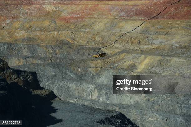 Dump truck drives along an access ramp in the White Foil open mine pit at Evolution Mining Ltd.'s gold operations in Mungari, Australia, on Tuesday,...