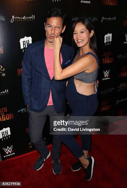 Actor George Young and wife TV personality Janet Hsieh attend the premiere of WWE Studios' "Birth of the Dragon" at ArcLight Hollywood on August 17,...
