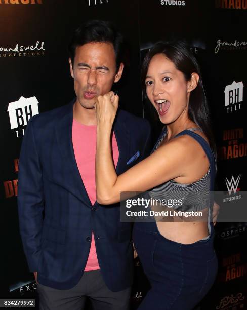 Actor George Young and wife TV personality Janet Hsieh attend the premiere of WWE Studios' "Birth of the Dragon" at ArcLight Hollywood on August 17,...