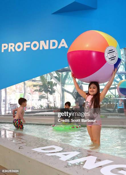 Children play in a 11 metre long swimming pool to celebrate the Australian premiere of The Pool exhibition at the National Gallery of Victoria...