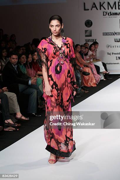 Indian model Indrani Das Gupta showcases a design by Preeti Chandra on the catwalk during Lakme Fashion Week 2008 day 5 held at NCPA on October 24,...