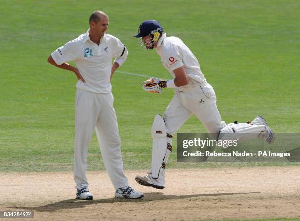 England's Kevin Pietersen runs past New Zealand bowler Chris Martin during the 3rd Test at McLean Park, Napier, New Zealand.