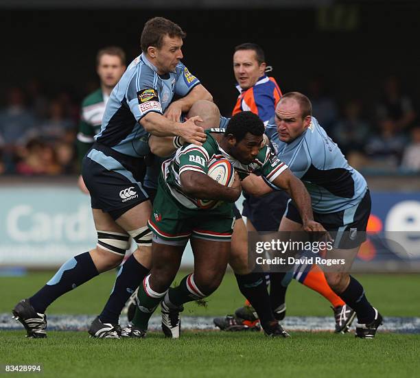 Seru Rabeni of Leicester is stopped by the Cardiff defence during the EDF Engery Cup match between Cardiff Blues and Leicester Tigers at the Arms...