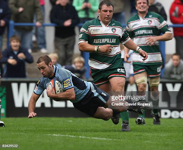 Jason Spice of Cardiff dives over to score the second try during the EDF Engery Cup match between Cardiff Blues and Leicester Tigers at the Arms Park...
