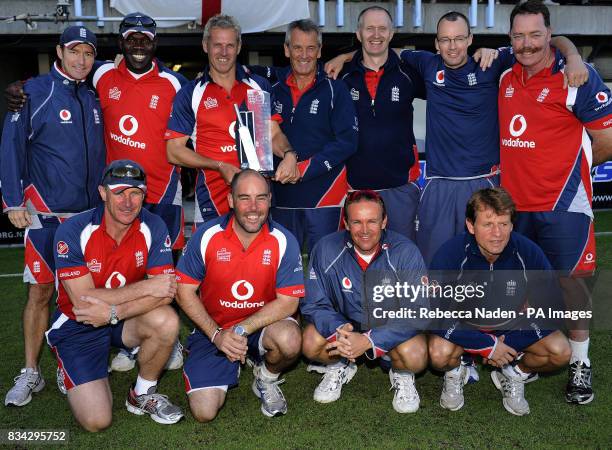 England Coach Peter Moores and his management team with the Series Trophy after winning the 3rd Test and Series 2-1 against New Zealand at McLean...