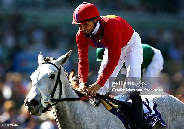 Jockey Mike Smith smiles atop Stardom Bound after crossing the finish line first to win the Breeders' Cup Juvenile Fillies race during the Breeders'...