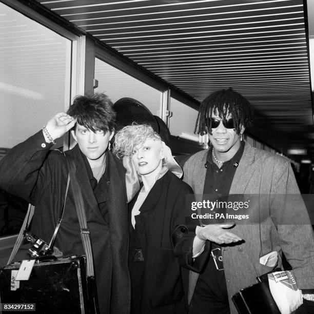 The Thompson Twins on arrival at Heathrow Airport from Germany after a television appearance for which they reportedly cancelled their sell-out...