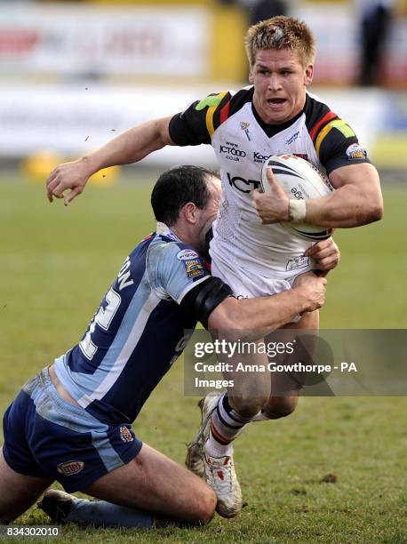 Bradford Bulls' Wayne Godwin is tackled by Castleford Tigers' Ryan Clayton during the engage Super League match at Odsal Stadium, Bradford.