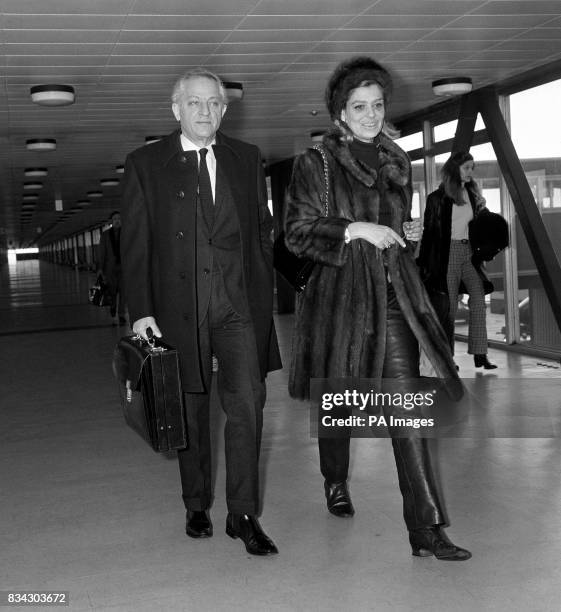 Greek actress, Melina Mercouri and her film director husband, Jules Dassin, at Heathrow Airport on arrival from Paris.