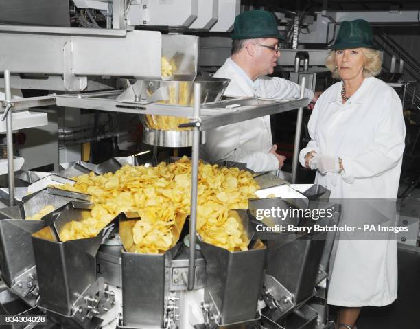 Managing Director Les Sayers with the Duchess of Cornwall during her tour of Tyrrells Potato Chip factory near Leominster, Herefordshire.