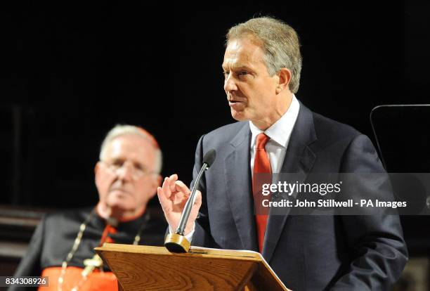 Former British Prime Minister Tony Blair during his address on Faith and Life in Britain, with Cardinal Cormac Murphy O'Connor seated behind him, in...