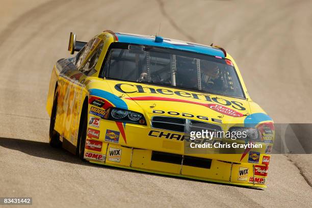 Bobby Labotne, driver of the Cheerios/Betty Crocker Dodge drives during practice for the NASCAR Sprint Cup Series Pep Boys Auto 500 at Atlanta Motor...