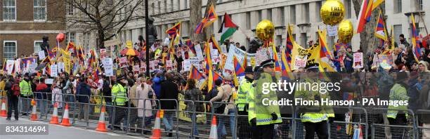 Protesters campaign for Tibet at Downing Street during part of the Olympic torch journey across London on its way to the lighting of the Olympic...