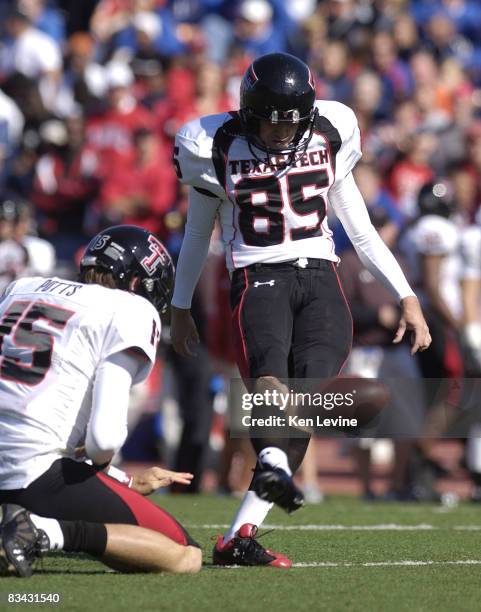Matt Williams of the Texas Tech Red Raiders kicks a point after a touchdown during the third quarter against the Kansas Jayhawks at Memorial Stadium...
