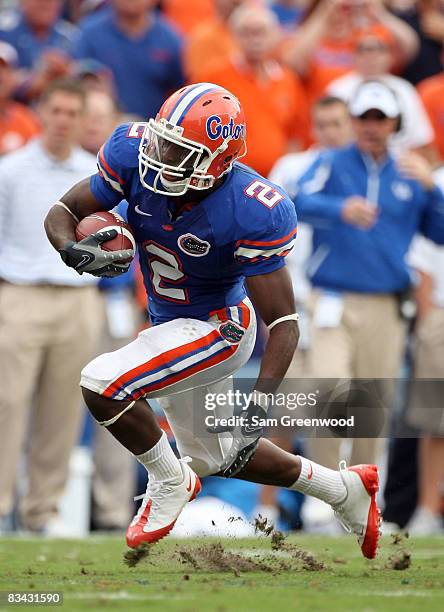 Jeffery Demps of the Florida Gators runs for a touchdown in a game aginst the Kentucky Wildcats at Ben Hill Griffin Stadium on October 25, 2008 in...