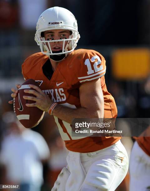 Quarterback Colt McCoy of the Texas Longhorns drops back to pass against the Oklahoma State Cowboys at Texas Memorial Stadium on October 25, 2008 in...