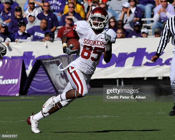 Wide receiver Ryan Broyles of the Oklahoma Sooners returns a punt 68-yards for a touchdown in the second quarter against the Kansas State Wildcats on...