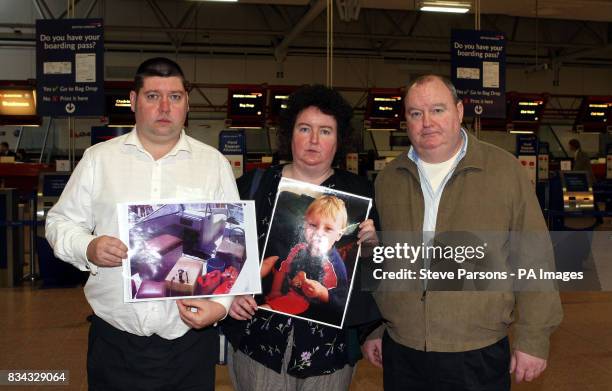 Paul and Andrea Gallagher and Paul's Uncle John McGuckion from Orpington, Kent, speak to media at Heathrow Airport's Terminal 4 ahead of flying to...