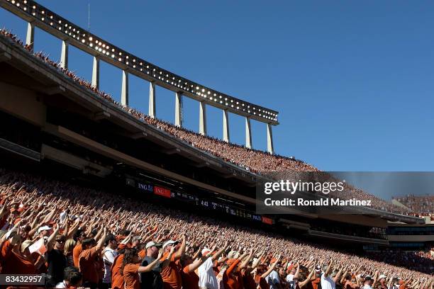 Fans of the Texas Longhorns cheer during a game against the Oklahoma State Cowboys at Texas Memorial Stadium on October 25, 2008 in Austin, Texas.