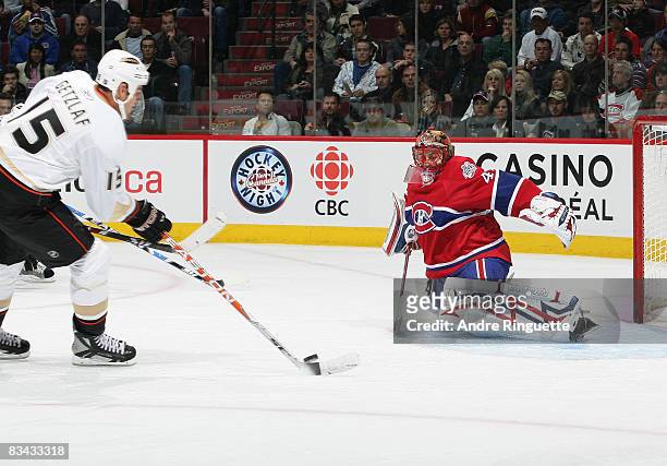 Ryan Getzlaf of the Anaheim Ducks shoots the puck against Jaroslav Halak of the Montreal Canadiens for a first period goal at the Bell Centre on...