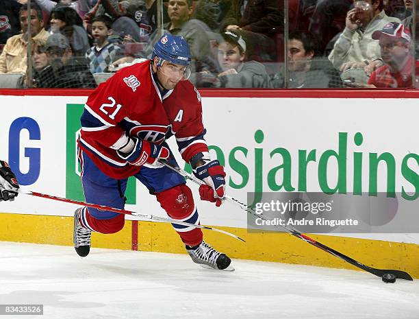 Christopher Higgins of the Montreal Canadiens stickhandles the puck against the Anaheim Ducks in his first game of teh 2008-2009 season at the Bell...