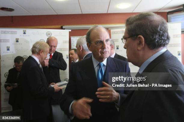 Senator George Mitchell talks with John Hume in BBC studios, Belfast, where politicians who negotiated The Good Friday Agreement ten years ago...